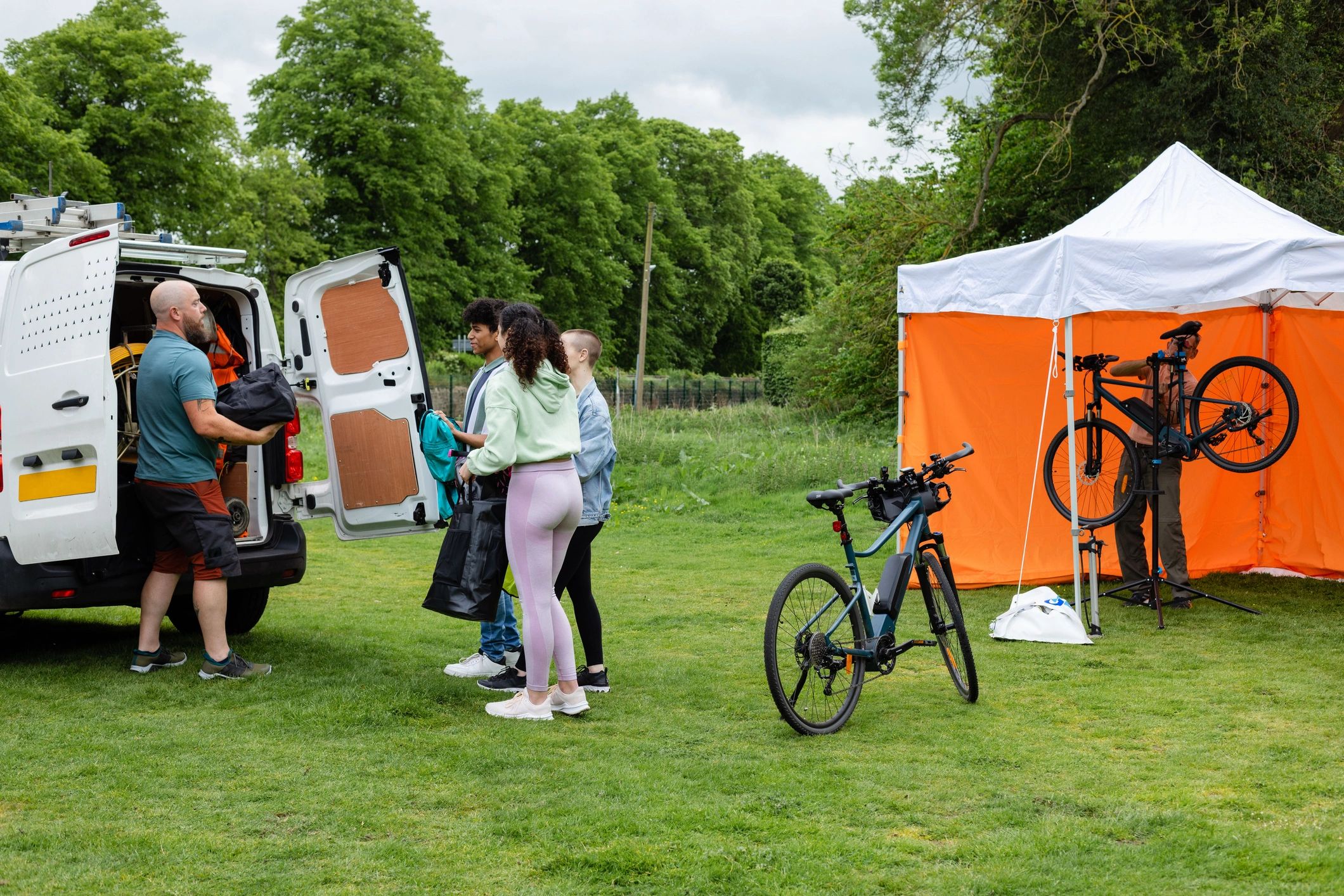 Outdoor rider gathering before a community ride